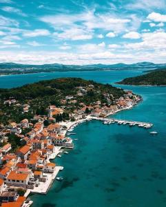 an aerial view of a harbor with boats in the water at Holiday Home Ana in Prvić Luka