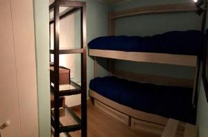 Poschodová posteľ alebo postele v izbe v ubytovaní Fantastico Refugio en La Parva