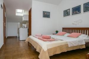 Voodi või voodid majutusasutuse Apartments Filippi toas