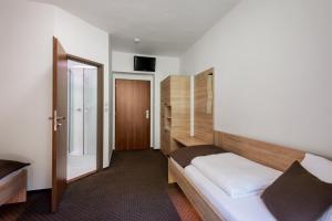 Postel nebo postele na pokoji v ubytování Hotel Bon
