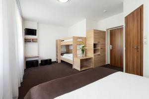 Postel nebo postele na pokoji v ubytování Hotel Bon