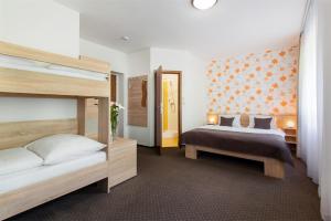 Postel nebo postele na pokoji v ubytování Hotel Bon