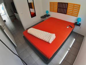 Cama ou camas em um quarto em Alameda Hostel