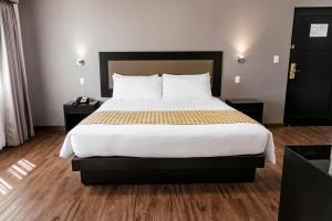 Voodi või voodid majutusasutuse Wyndham Costa del Sol Piura toas