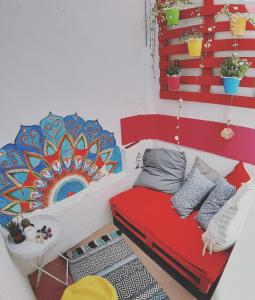Uma área de estar em Alameda Hostel