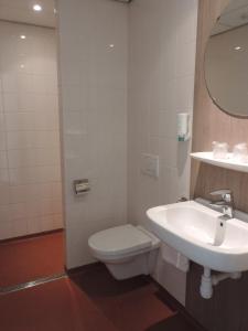 Koupelna v ubytování Hotel Ekamper
