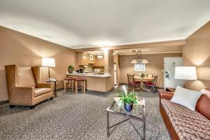 a living room with a couch and a table at Forest Suites Resort at the Heavenly Village in South Lake Tahoe