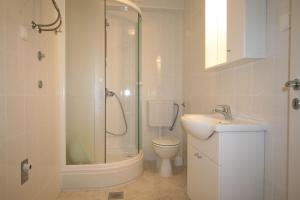 Ein Badezimmer in der Unterkunft Apartments Hodzic