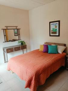 Katil atau katil-katil dalam bilik di Tu casa Oaxaca...