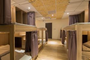 Postel nebo postele na pokoji v ubytování Hostel Jiizu