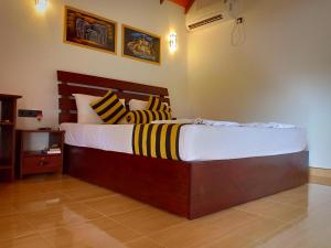 Letto o letti in una camera di Sigiriya Nature Resort