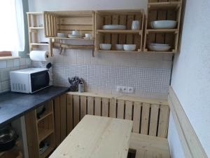 Kuchyň nebo kuchyňský kout v ubytování Apartmány Sharka -Šárka Justrová