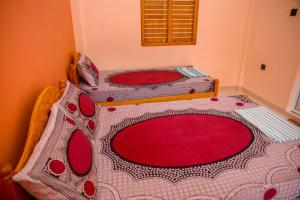 Postel nebo postele na pokoji v ubytování Tulip Guest Inn