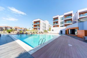 Bazén v ubytování Green Hills Suites nebo v jeho okolí