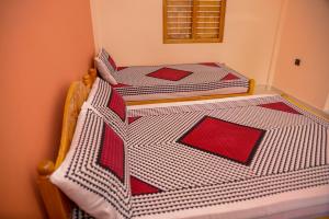 Postel nebo postele na pokoji v ubytování Tulip Guest Inn
