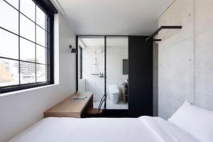 Cama ou camas em um quarto em HOTEL CEN