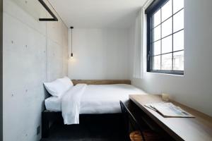 Cama ou camas em um quarto em HOTEL CEN