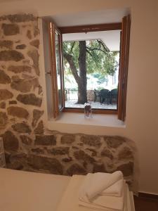 Posteľ alebo postele v izbe v ubytovaní Apartments Jungic, Rab
