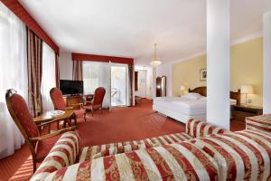Postel nebo postele na pokoji v ubytování Hotel Mühle Mayer