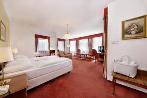 Postel nebo postele na pokoji v ubytování Hotel Mühle Mayer
