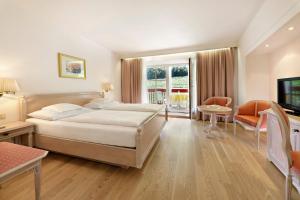 Postel nebo postele na pokoji v ubytování Hotel Mühle Mayer