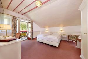 Postel nebo postele na pokoji v ubytování Hotel Mühle Mayer