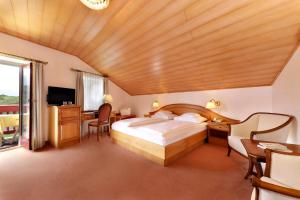 TV a/nebo společenská místnost v ubytování Hotel Mühle Mayer
