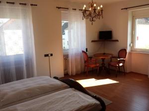 Postel nebo postele na pokoji v ubytování Hotel Dorfschenke