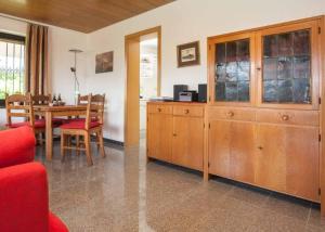 a living room with a dining table and a dining room at Ferienwohnung Steinacker am Gerkenstein in Winterberg