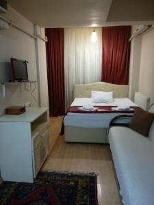 Cama o camas de una habitación en Istanbul Ataman Suites