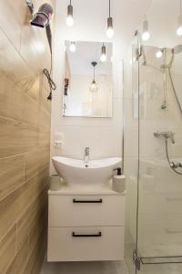 Kúpeľňa v ubytovaní CR Apartament przy Rynku Sienkiewicza 6