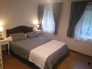 Una cama o camas en una habitación de Lekeitio. Bekoerrota, casa molino Ikaran