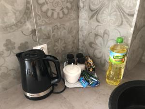 Príslušenstvo na prípravu kávy alebo čaju v ubytovaní CR Apartament przy Rynku Sienkiewicza 6
