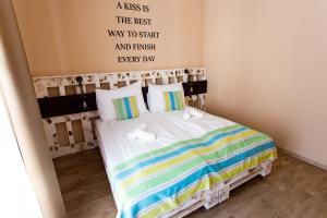 Postel nebo postele na pokoji v ubytování Hotel Carpe Diem