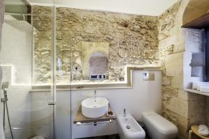 Kúpeľňa v ubytovaní Centosedici Rooms + 24 fotografií