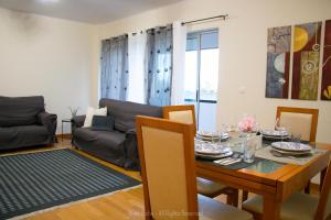 Posezení v ubytování Apartamento Lombinha