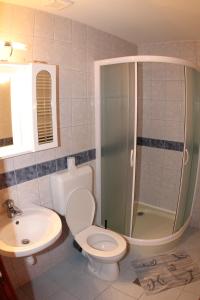 Ванная комната в Őrszem Fogadó