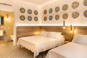 Postel nebo postele na pokoji v ubytování Filinona B&B