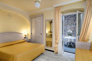 Кровать или кровати в номере Hotel Due Mari