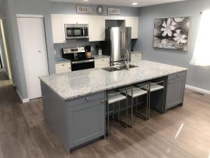 a kitchen with a sink and a counter top at Liberty House in Bethany