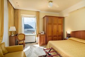 Кровать или кровати в номере Hotel Due Mari
