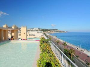 a view of the ocean from the balcony of a resort at Studio 7 Promenade des Anglais in Nice