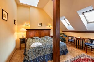 Ein Bett oder Betten in einem Zimmer der Unterkunft Salvator Hotel