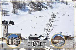 a group of people skiing down a ski slope at Chalet Goloseria in Livigno