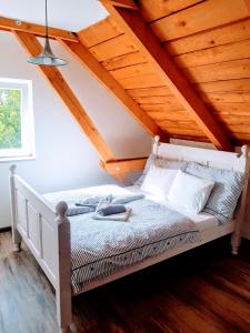 Postel nebo postele na pokoji v ubytování Čenovický dvůr