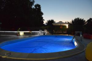 The swimming pool at or close to Guest House Raiski Kаt