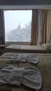 Postel nebo postele na pokoji v ubytování Monte Cervino Hotel