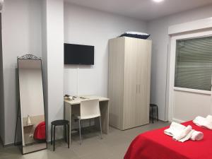 A bed or beds in a room at B&B San Francesco di Paola