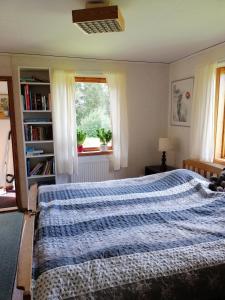 Postel nebo postele na pokoji v ubytování Ämtön