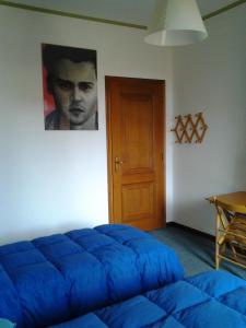 A bed or beds in a room at Le Magnolie B&B